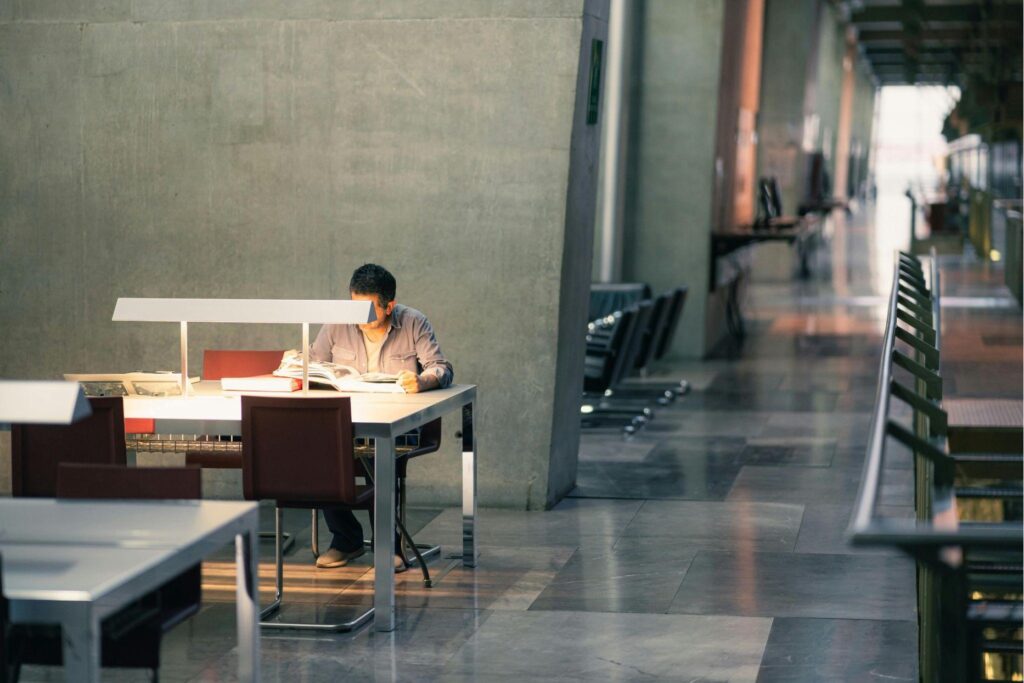 Man studying in library